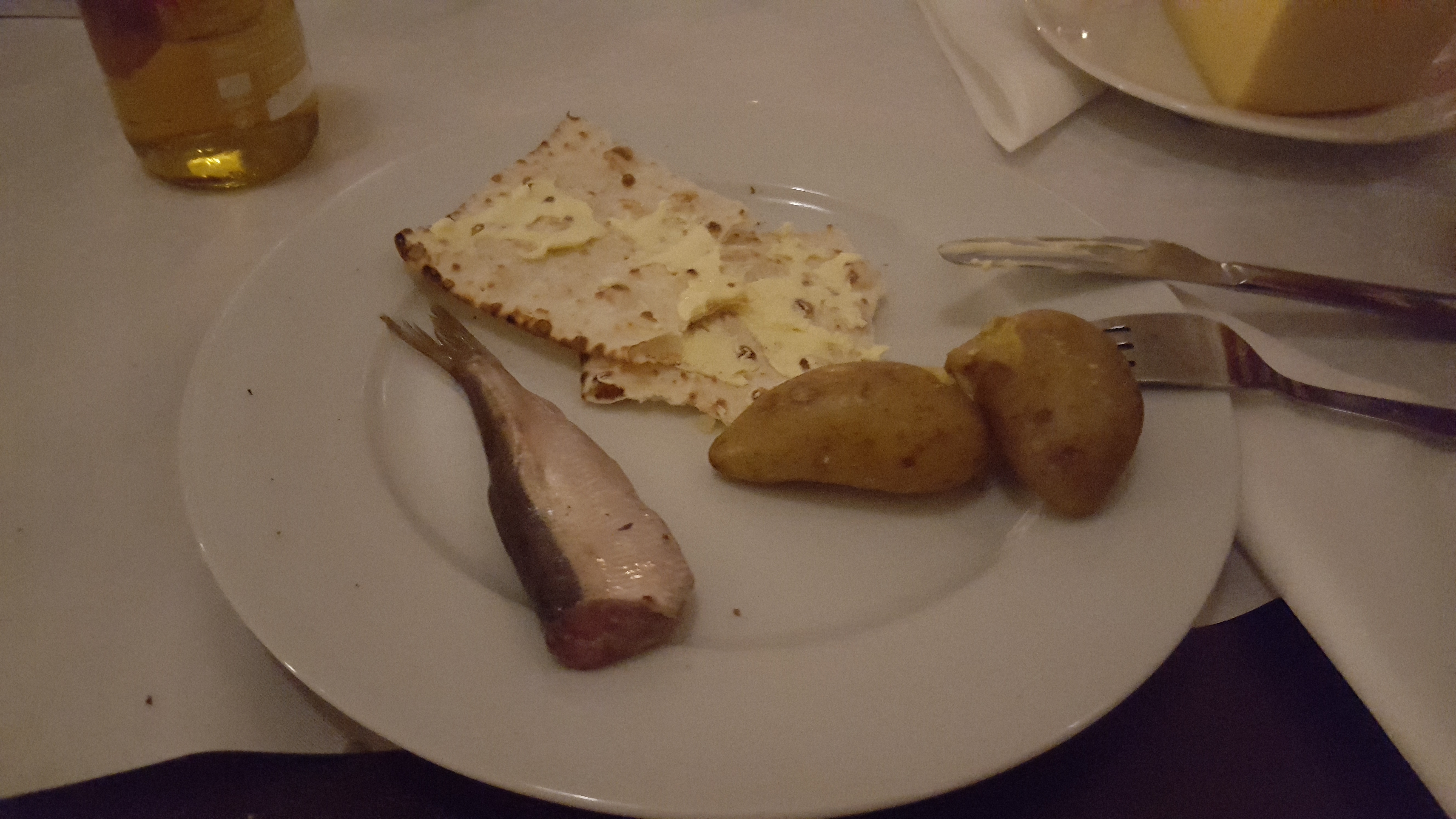 Surströmming on the plate